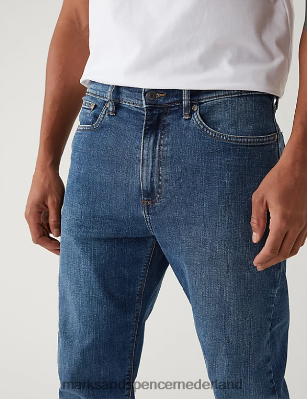Marks & Spencer Heren Stretchjeans met taps toelopende pasvorm middelblauw kleding N8VZP6662