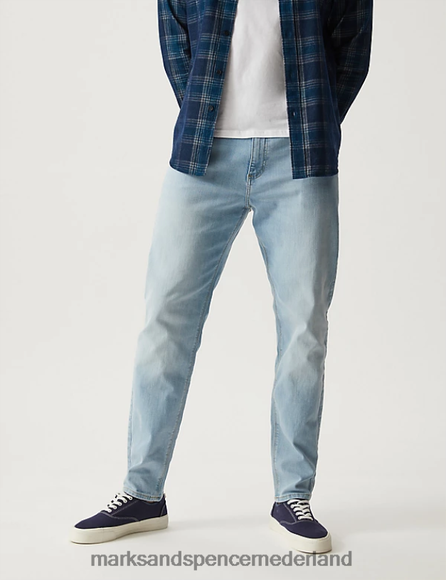 Marks & Spencer Heren Stretchjeans met taps toelopende pasvorm poeder blauw kleding N8VZP7027